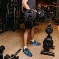 Athlete lifting a barbell in the gym